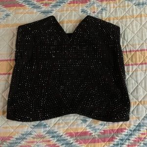 Never worn, small, strapless spark top.